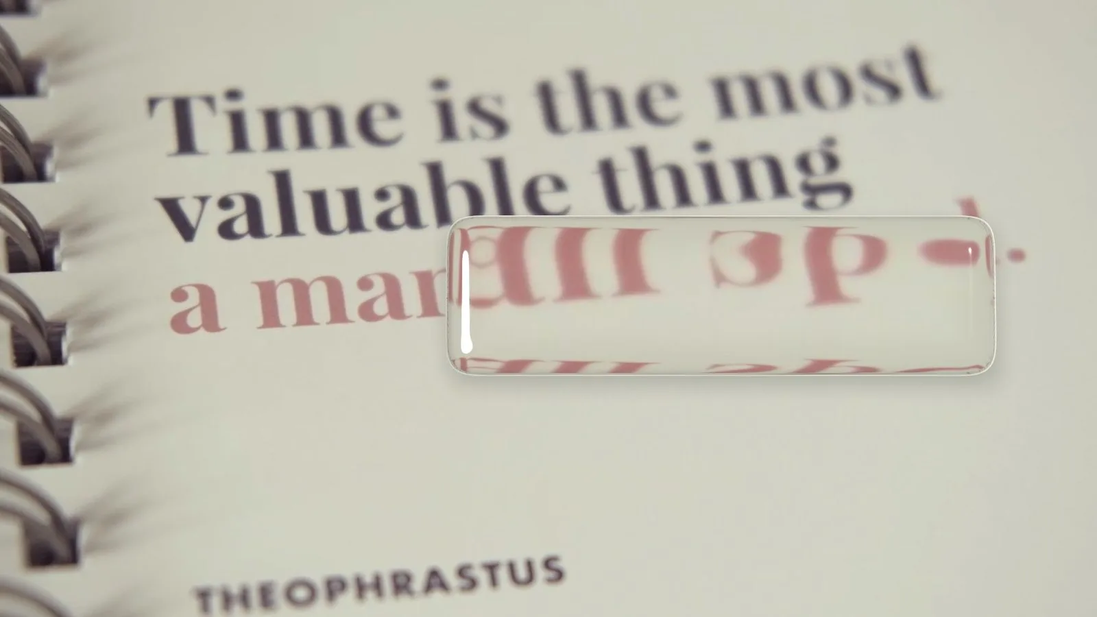 Magnifier bar over a notebook
