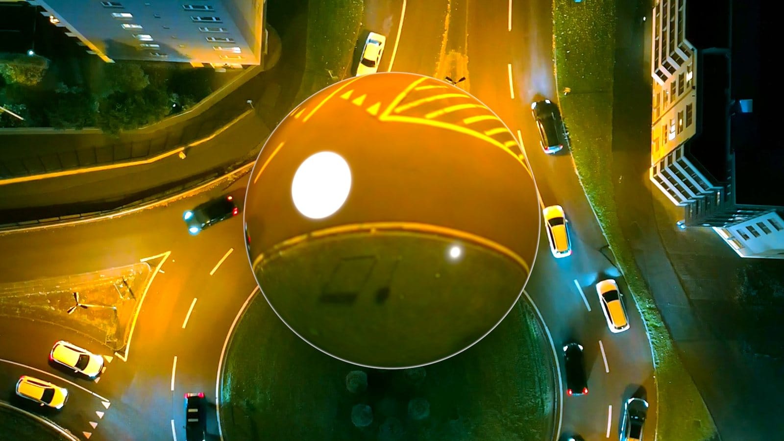 Ball lens over traffic at night