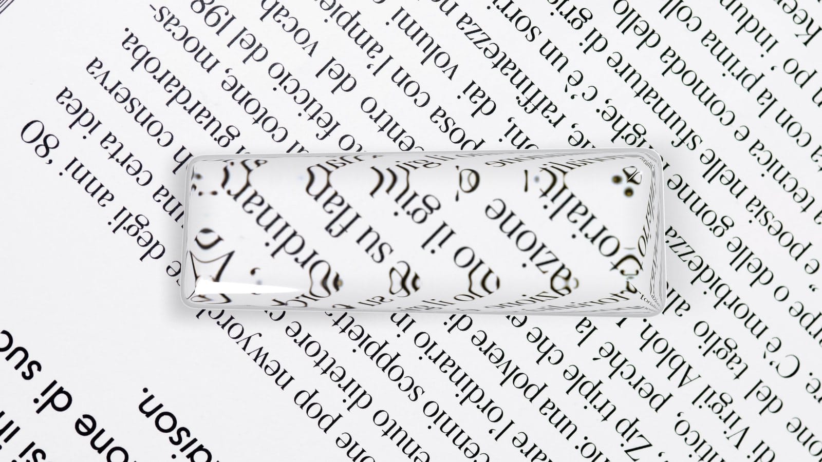 Glass bar over a dictionary page